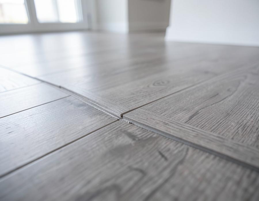 Luxury vinyl plank flooring being installed